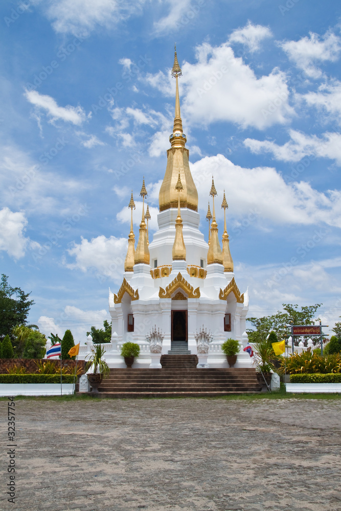Golden Pagoda and blue sky in Wat Tham Khuha Sawan,Ubonratchatha