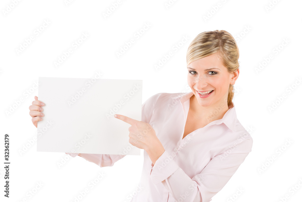 Businesswoman pointing aside at white banner Businesswoman pointing aside at white banner