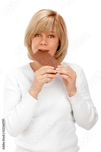Closeup portrait of a beautiful adult woman holding big chocolat