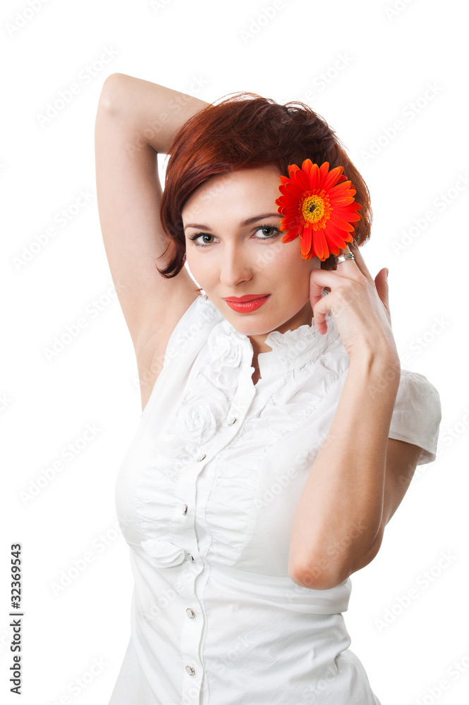 Beautiful woman with flower gerbera in her hands against white b Beautiful woman with flower gerbera in her hands against white b