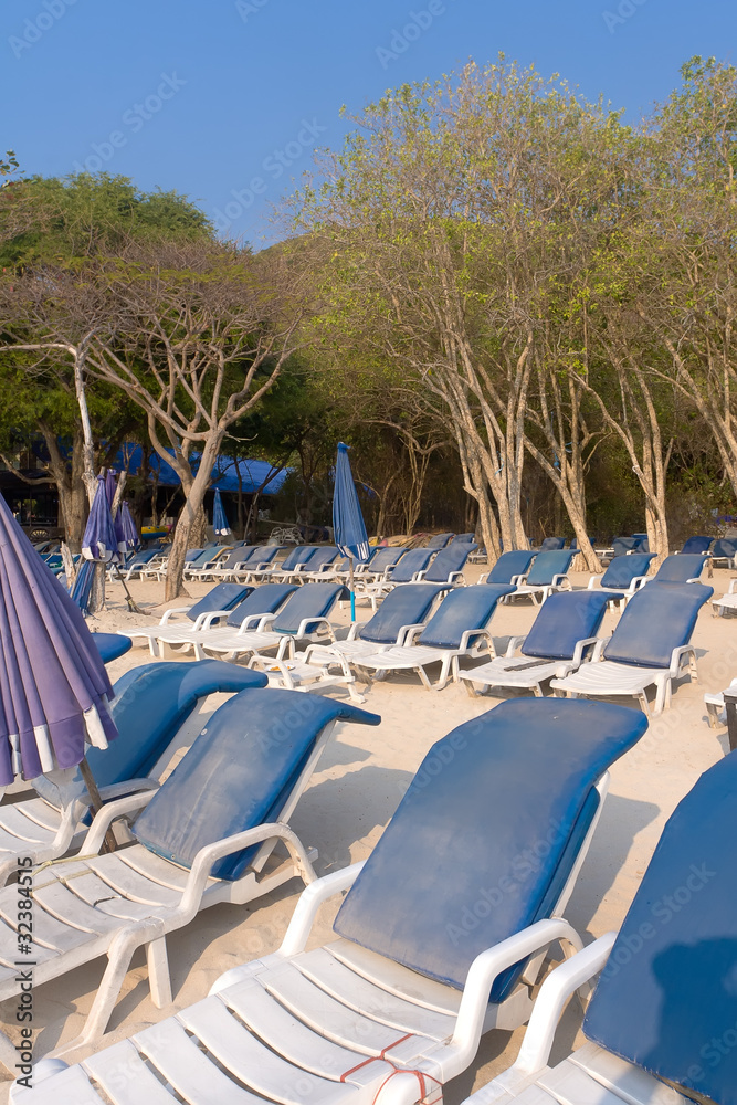 Ranks of sun beds for sunbathing on the beach Ranks of sun beds for sunbathing on the beach