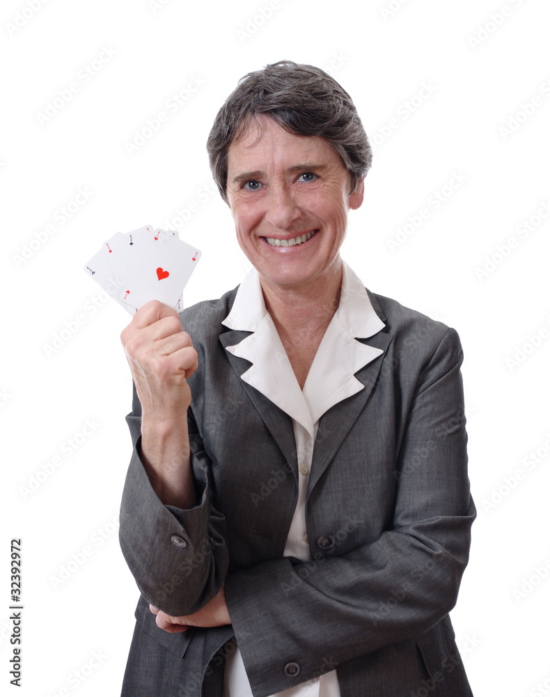 happy mature lady showing four aces isolated on white happy mature lady showing four aces isolated on white