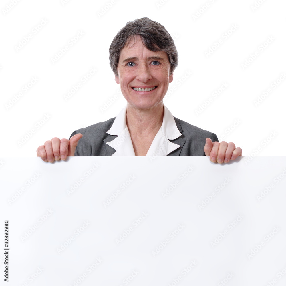 mature smiling woman holding white board isolated on white mature smiling woman holding white board isolated on white