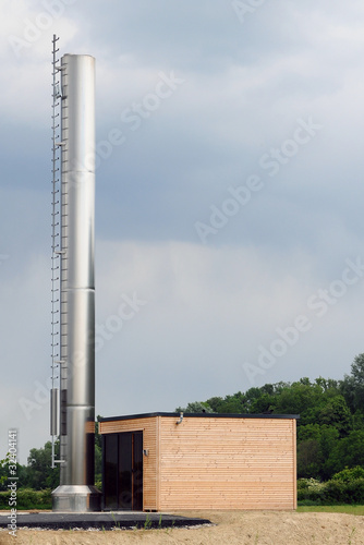 Holzhackschnitzelanlage in Wohngebiet photo