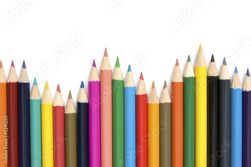 row of colorful pencils with copy space.
