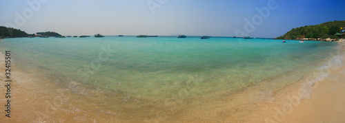 Fototapeta Naklejka Na Ścianę i Meble -  The white sand on the shores of a paradise island