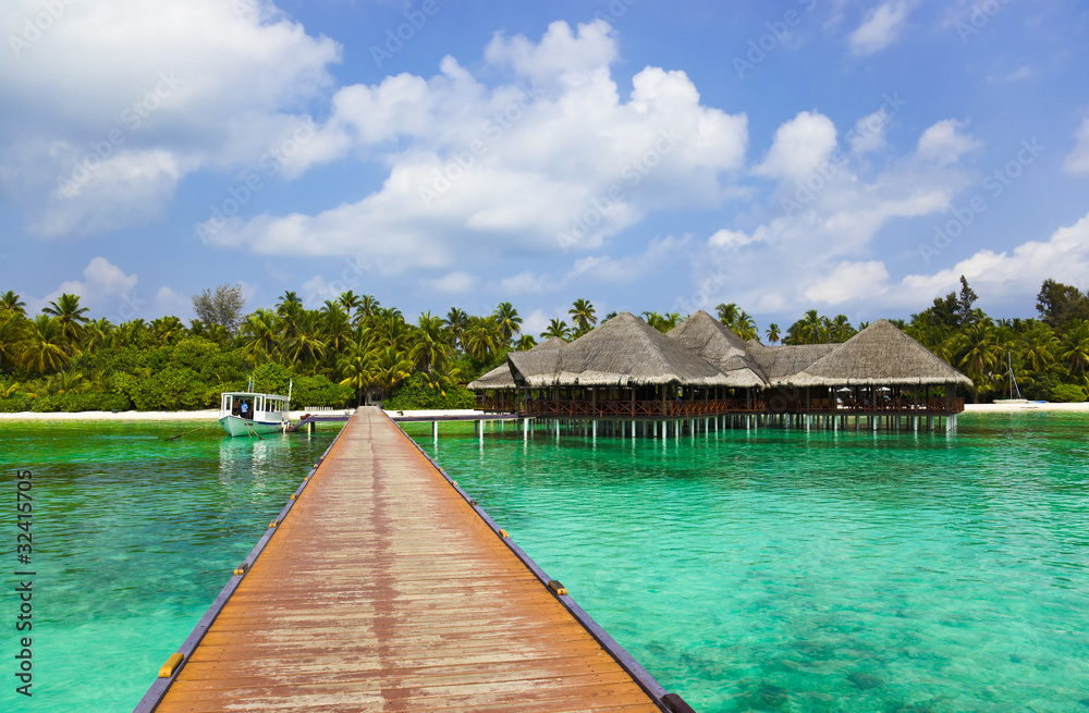 Water cafe on a tropical beach at Maldives