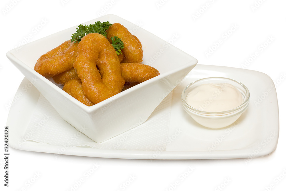 Fried squid rings isolated on white Fried squid rings isolated on white