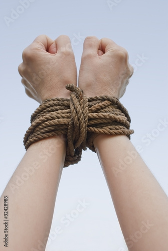 Tied with rope hands