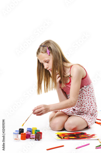 Girl with brush on white background