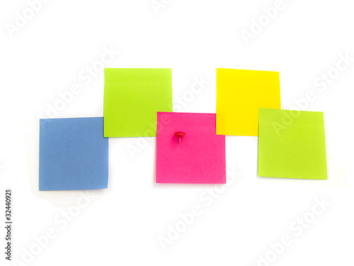 multicolored blank post it notes isoalated over white