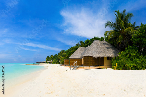 Tropical beach and bungalows