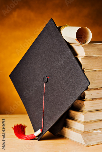 Graduation cap and books
