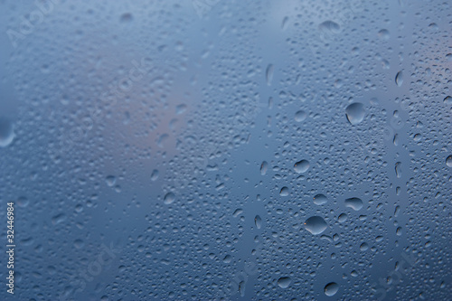 Water droplets on the glass surface.