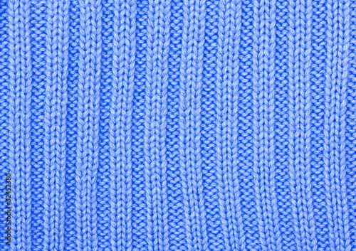 Knitted blue cloth close up, a background