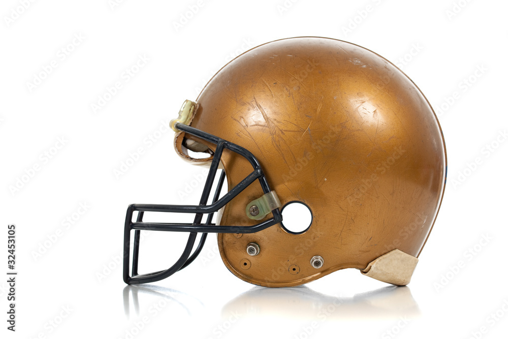 Fototapeta premium Gold football helmet on a white background