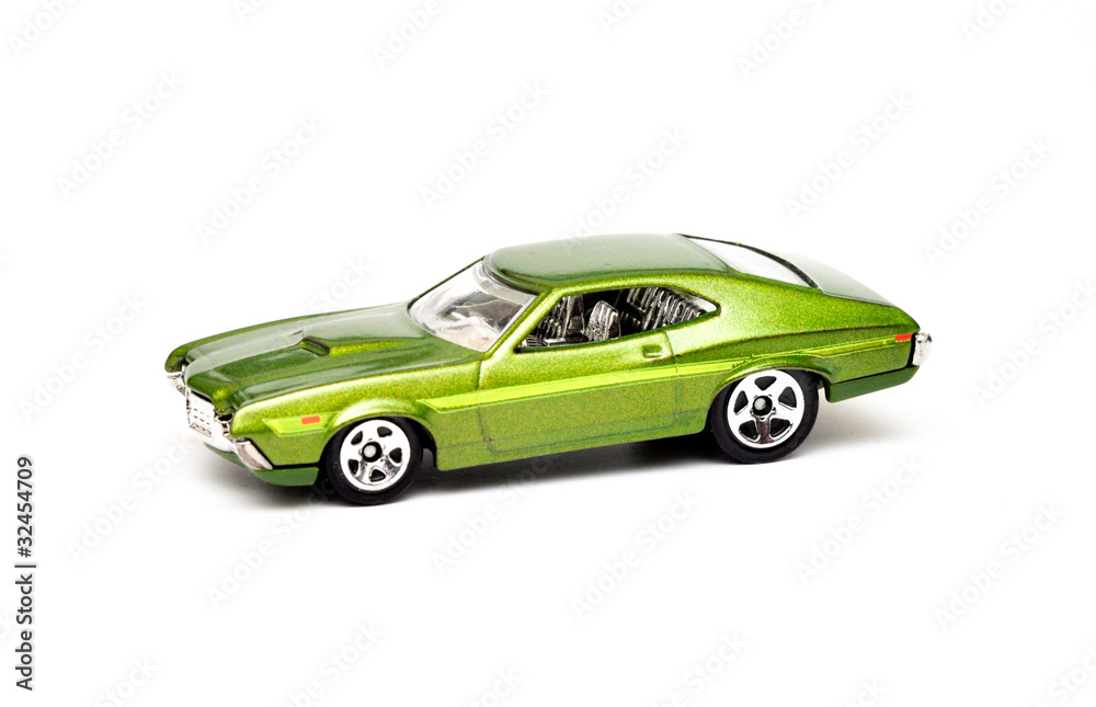 Green Metal toy car isolated on white