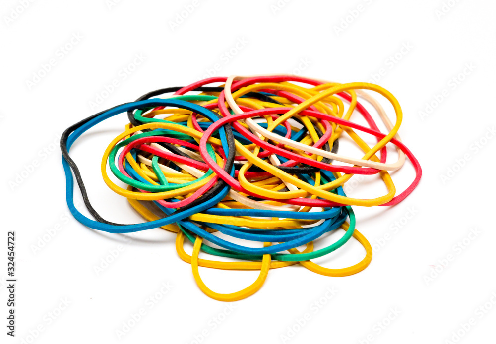Multi-colored fixing elastic bands isolated on the white Multi-colored fixing elastic bands isolated on the white