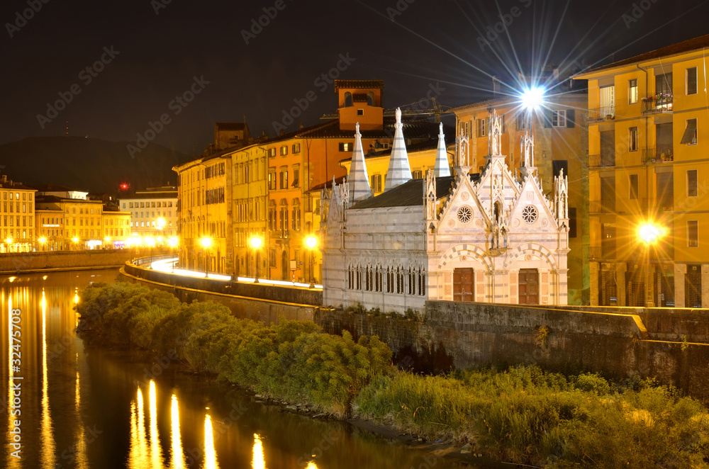 Church Santa Maria de la Spina and Arno river at night, Pisa, Tu