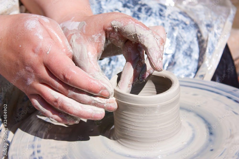 Hands Potter and Wheel