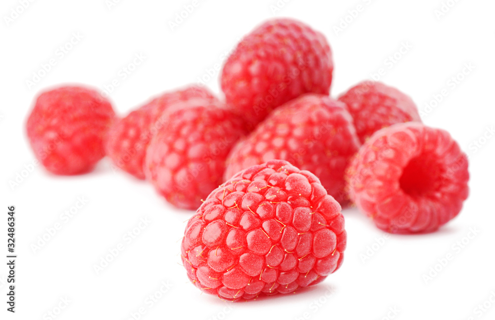 Isolated berries. Raspberry fruits isolated on white background, selective focus Isolated berries. Raspberry fruits isolated on white background, selective focus