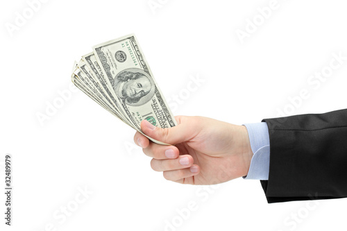 Hand holding US dollars