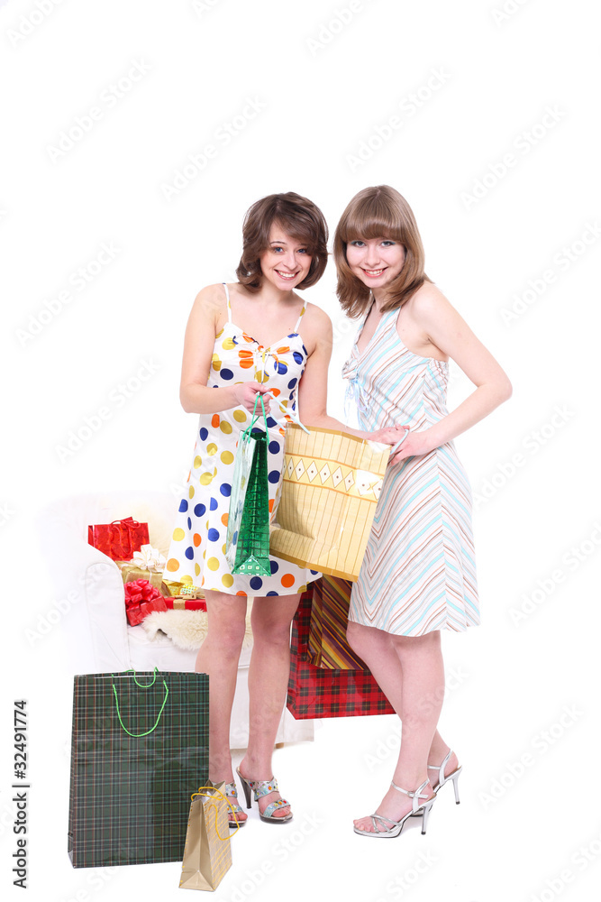 Two happy friends with purchases.
