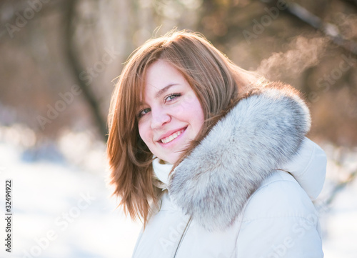 Young woman winter portrait. Shallow dof.