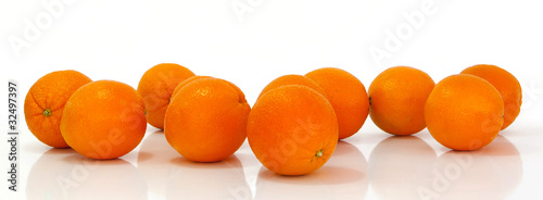 multiple oranges against a white background