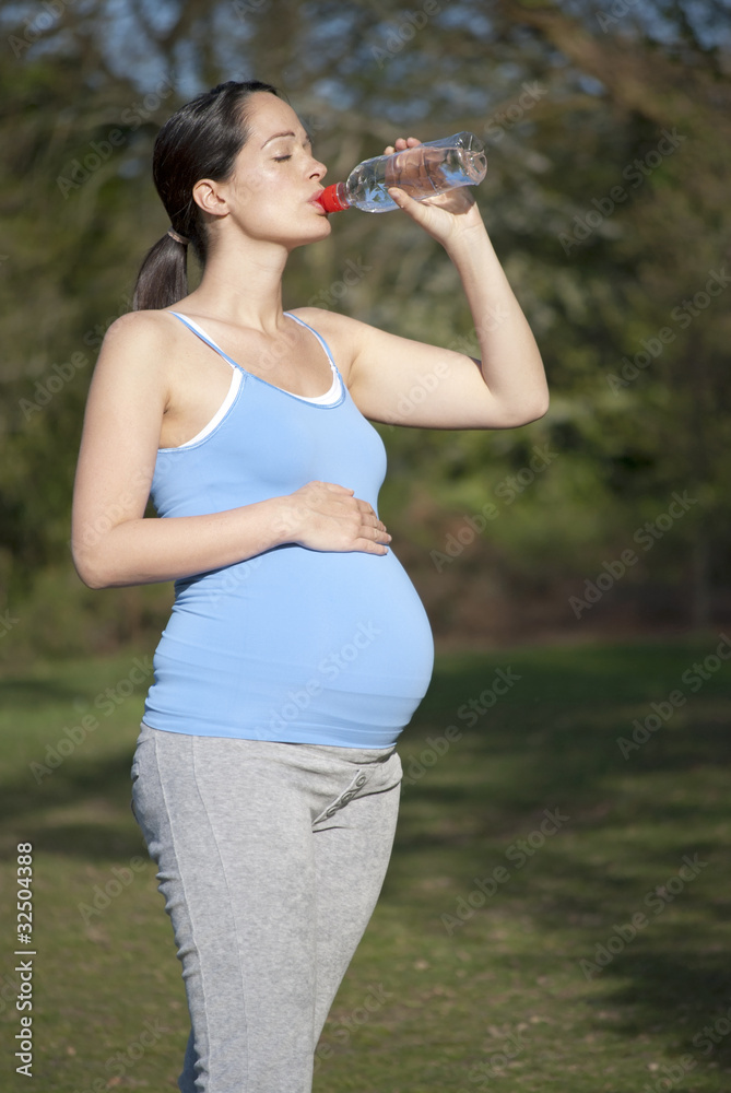Pregnant woman drinking water
