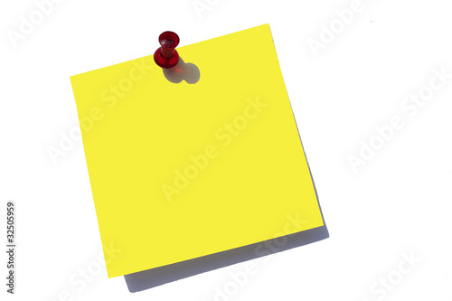 Yellow sticky note and push pin on white with clipping path..