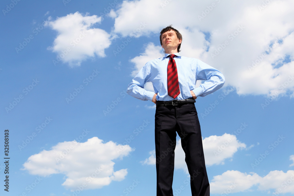 young business man in a blue shirt and red tie young business man in a blue shirt and red tie
