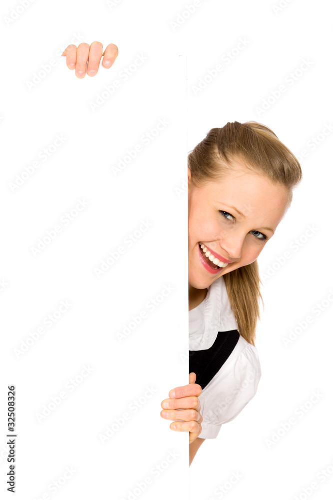 Woman peeps out from behind the blank board