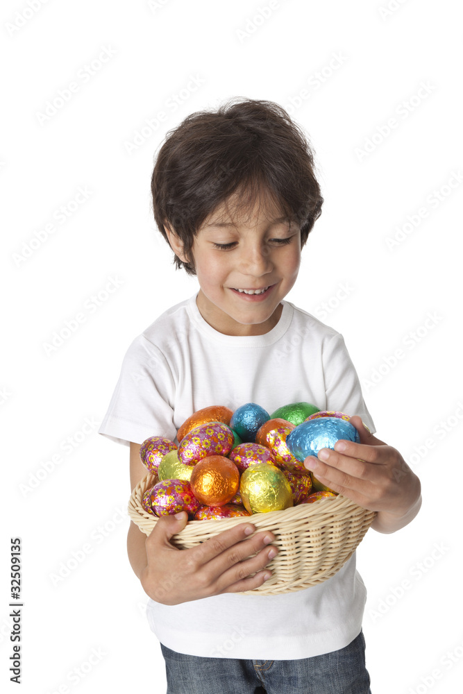 Little boy with chocolate easter eggs Little boy with chocolate easter eggs