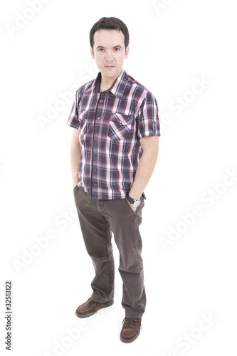 man standing with hands on pocket