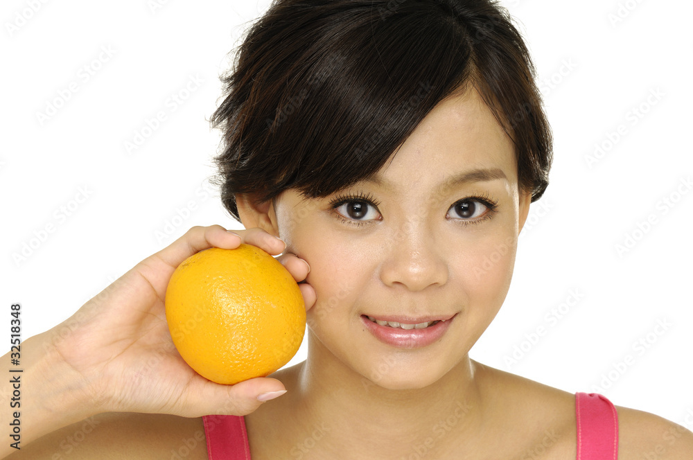 Close up young woman with tropical fruit Close up young woman with tropical fruit