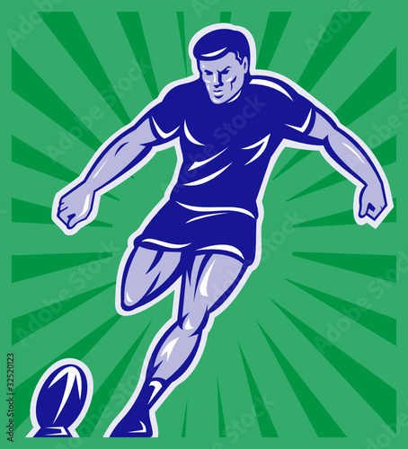 rugby player kicking ball