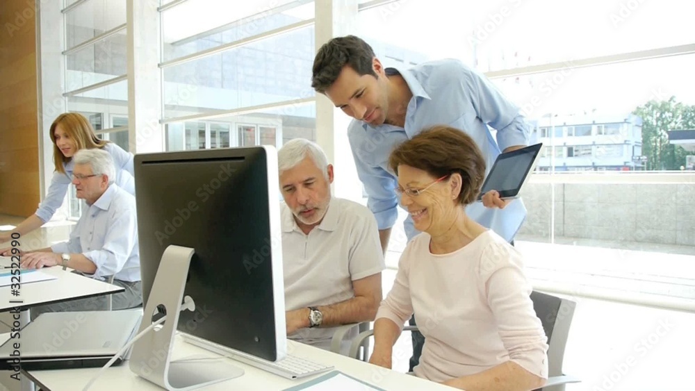 Group of senior people in business training