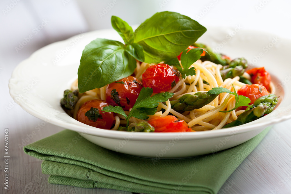 Spaghetti with green asparagus and cherry tomato