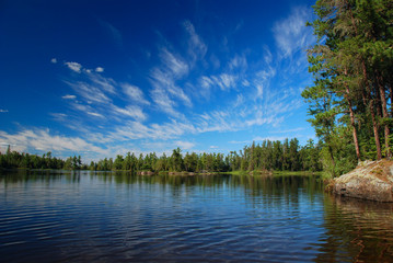 Leinwandbilder See Wildnissee unter sommerlichem Himmel  © wildnerdpix
