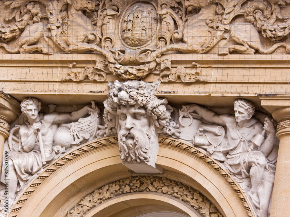 Carving on commercial building in Bristol UK Carving on commercial building in Bristol UK