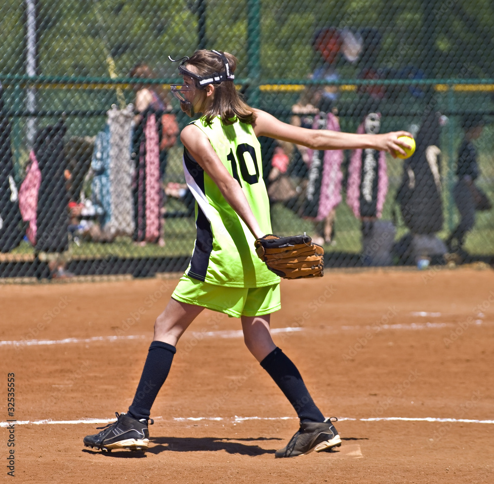 Fototapeta premium Girl Pitching Softball game