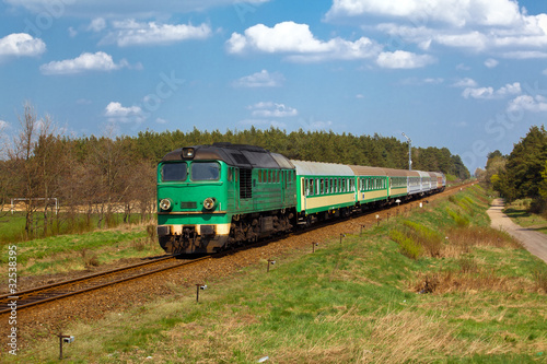 Passenger train passing through countryside