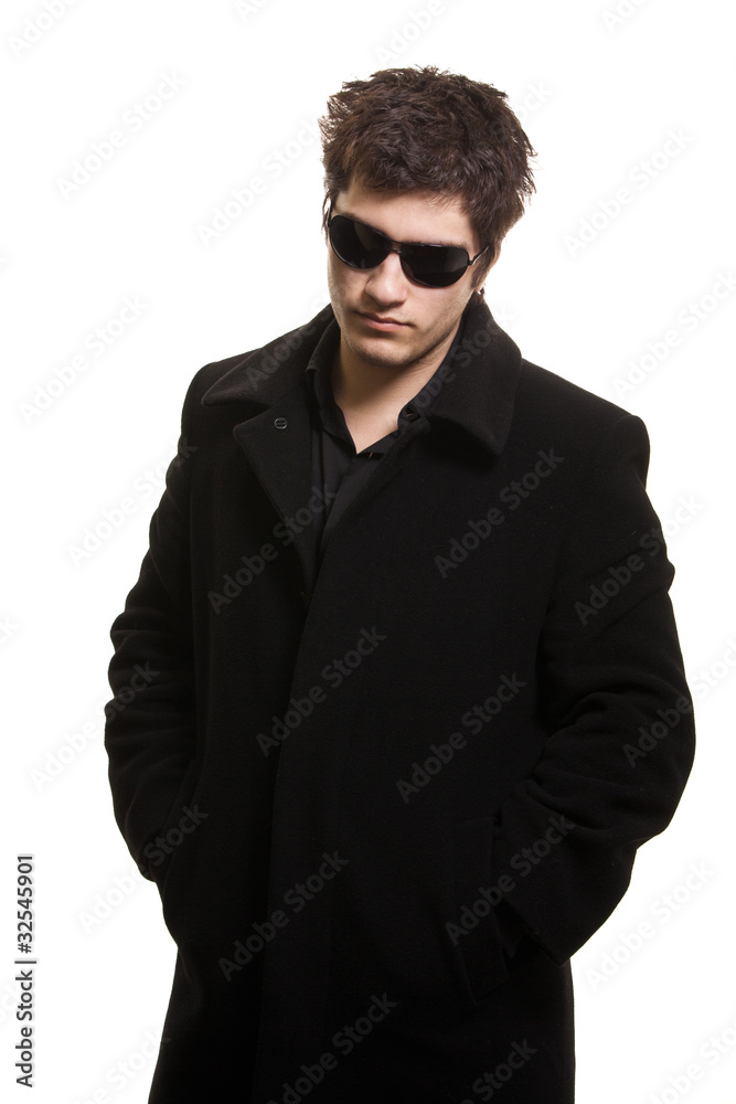 confidence man in black coat and sunglasses confidence man in black coat and sunglasses