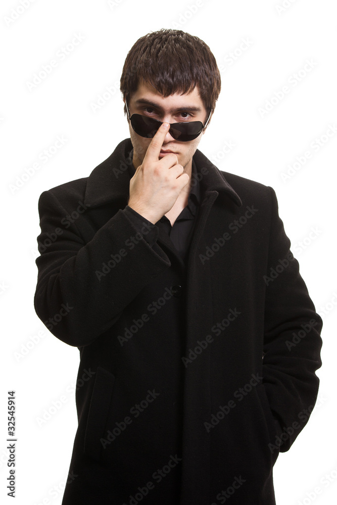 confidence man in black coat and sunglasses confidence man in black coat and sunglasses