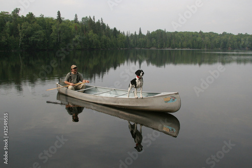 Принти на полотні Canoeist and Dog - Ontario, Canada