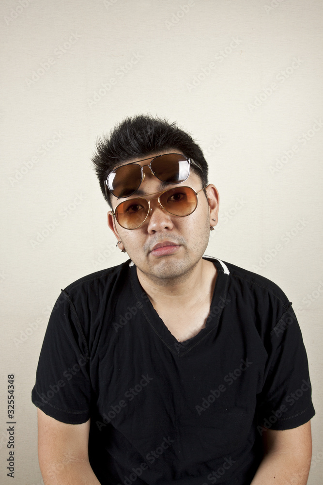 4 eyes, a man act funny with 2 sunglasses. 4 eyes, a man act funny with 2 sunglasses.