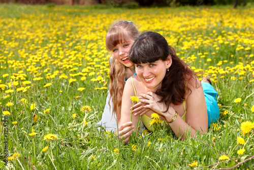 Happy mother and daugter in park. photo