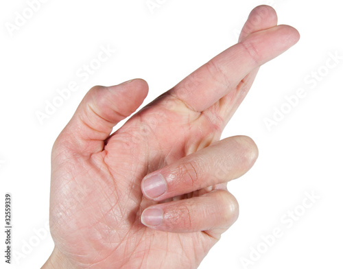 Photos fingers crossed isolated on white background
