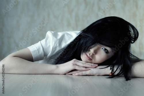 Girl rest on table